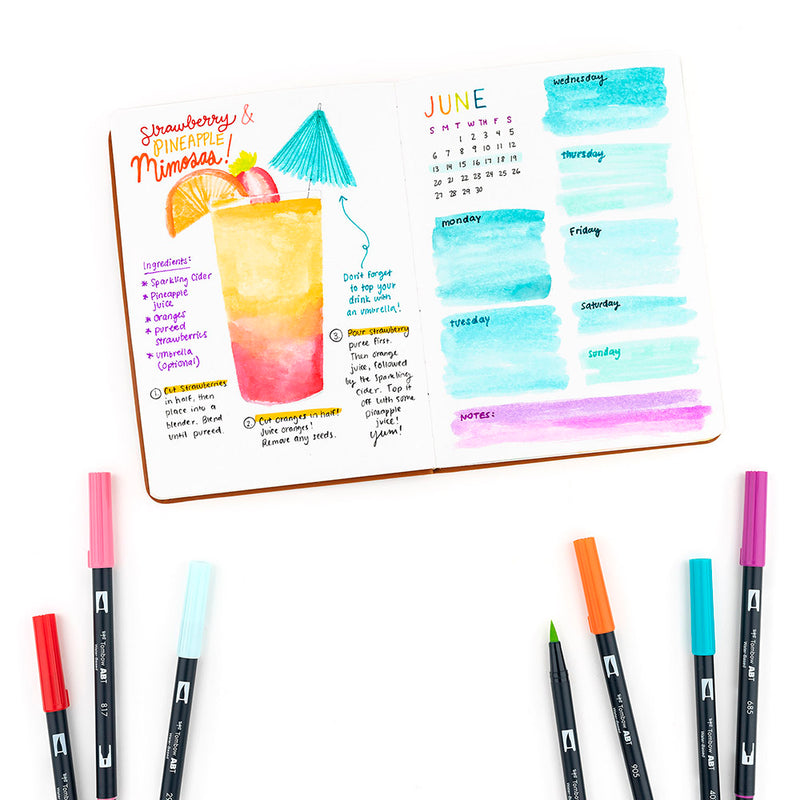 Tombow Dual Brush Set 10 - Tropical image of a bullet journal with a drink on the page
